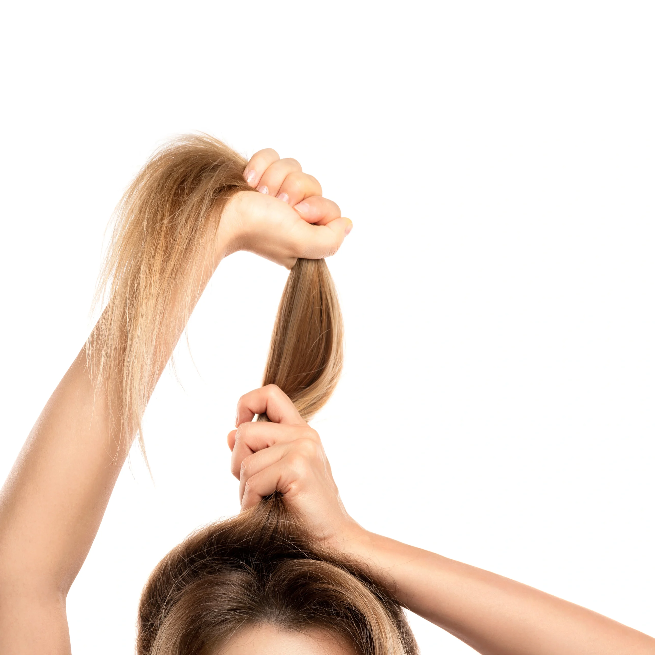 woman holding her hair